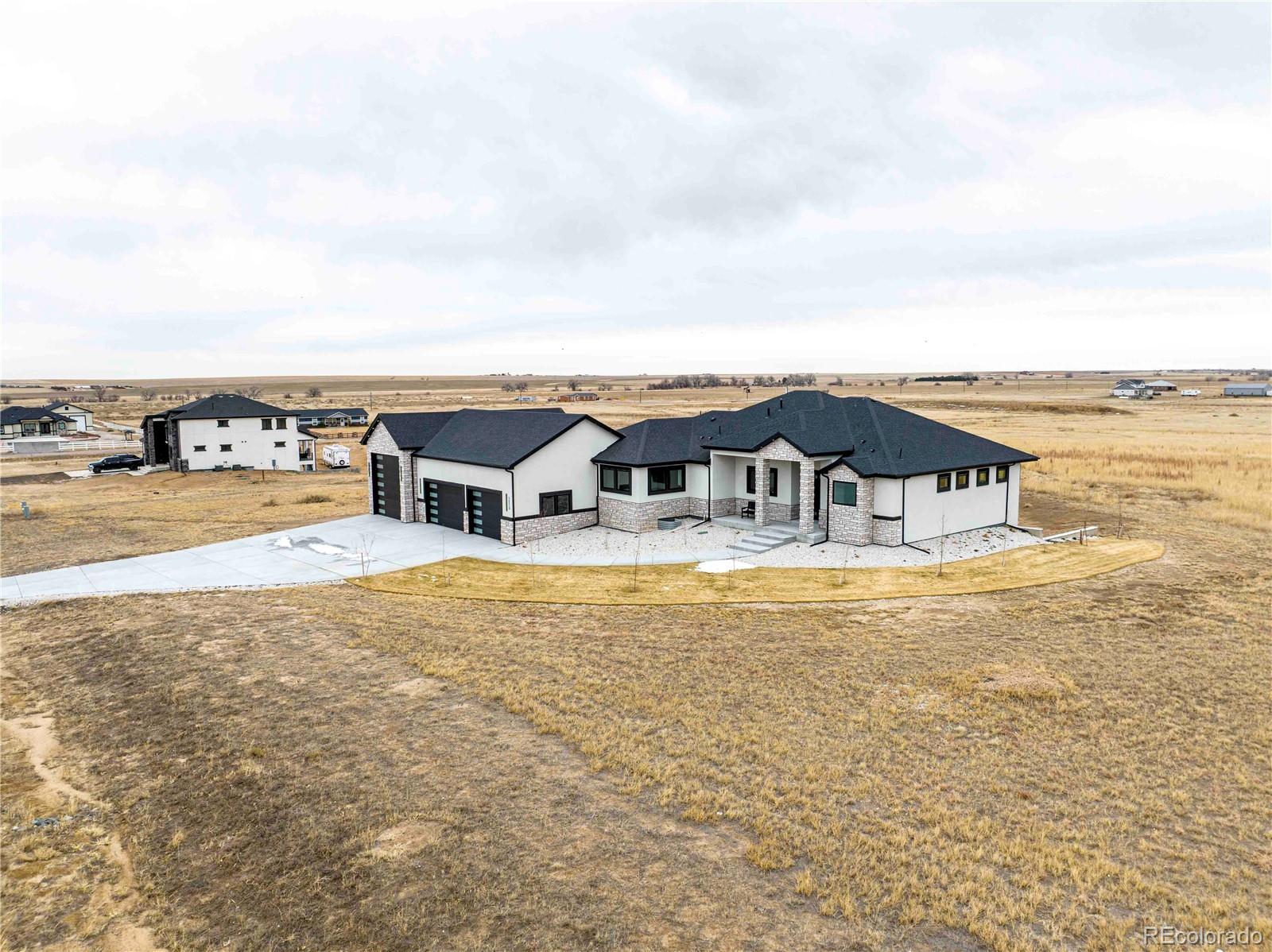 Grasslands At Comanche Strasburg Home | MLS #: 221313956520 E 74th Avenue, Strasburg Beds: 6 Baths: 5 Price: $1,225,000