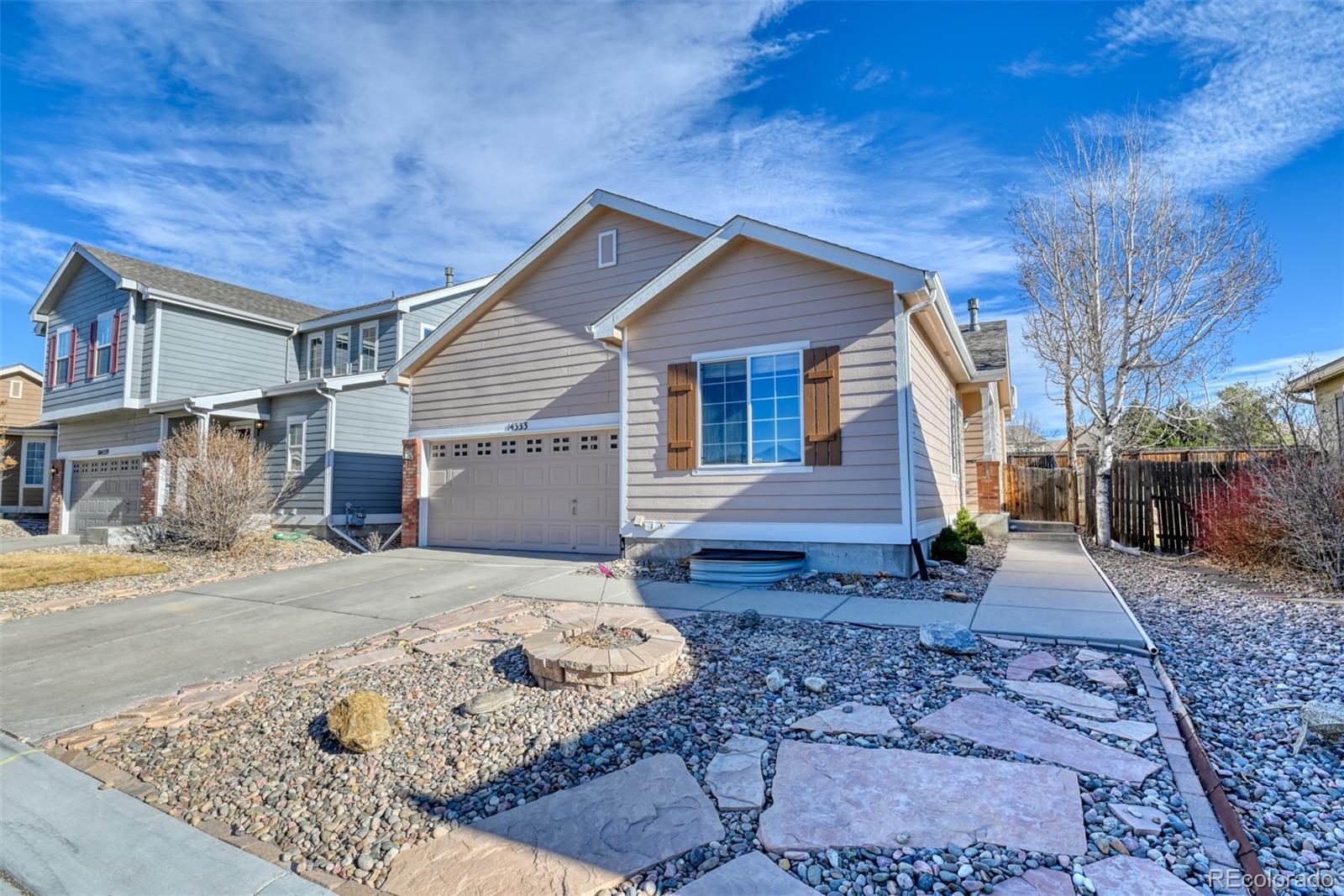 Falcon Colorado Springs Home | MLS #: 875632914333  Woodrock Path, Colorado Springs Beds: 3 Baths: 3 Price: $469,000