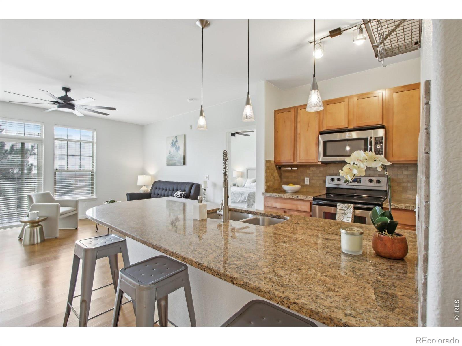 Vantage Pointe Broomfield Condo / Townhome | MLS #: 456789105086213456  Via Varra  211, Broomfield Beds: 2 Baths: 2 Price: $350,000