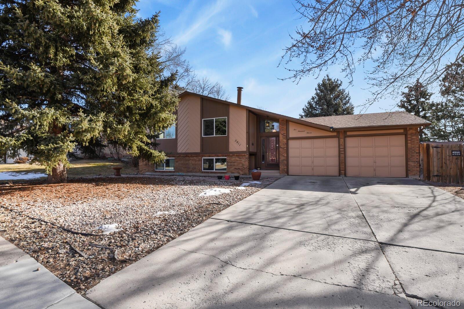 Vista Grande Colorado Springs Home | MLS #: 57033325011 N Hackamore Drive, Colorado Springs Beds: 5 Baths: 3 Price: $495,000