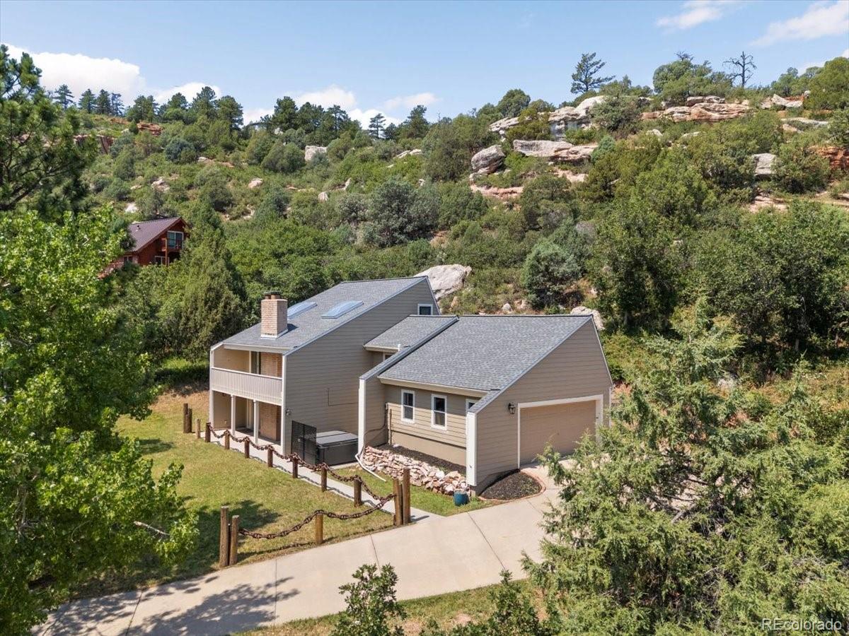 Perry Park Larkspur Home | MLS #: 71028507085  Kiowa Road, Larkspur Beds: 3 Baths: 4 Price: $699,000