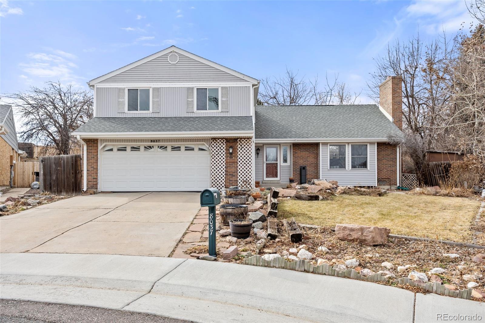 Wood Run Arvada Home | MLS #: 68200078037  Iris Court, Arvada Beds: 4 Baths: 3 Price: $599,000