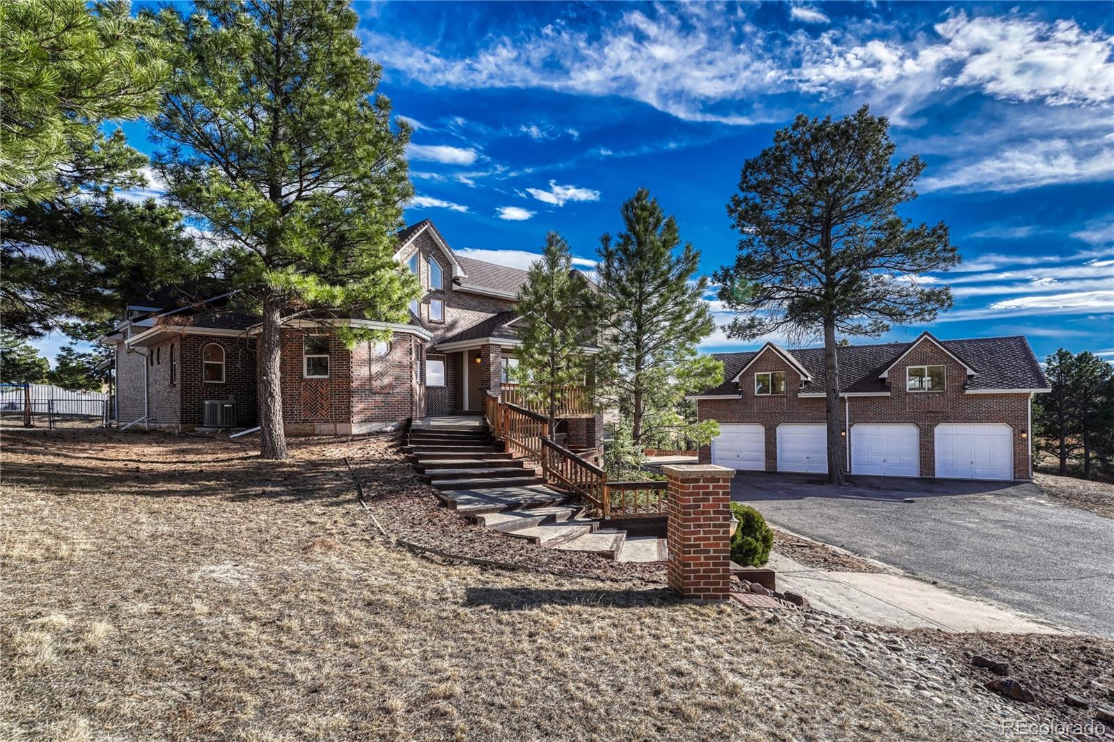 Meadow Station Parker Home | MLS #: 850508743097  London Drive, Parker Beds: 6 Baths: 4 Price: $1,050,000