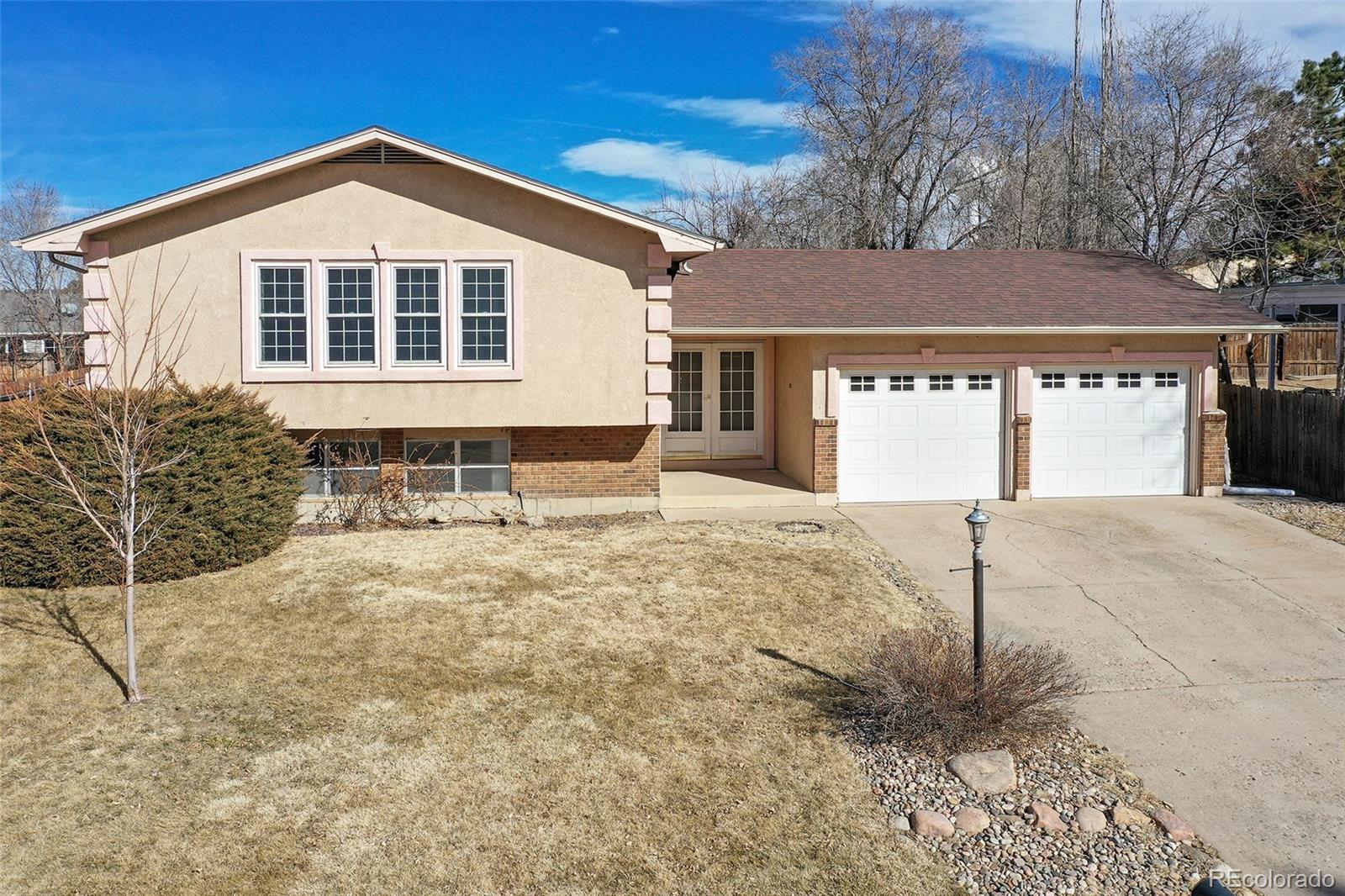 Clear View Estates Colorado Springs Home | MLS #: 22172175050  Manzana Drive, Colorado Springs Beds: 4 Baths: 3 Price: $375,000