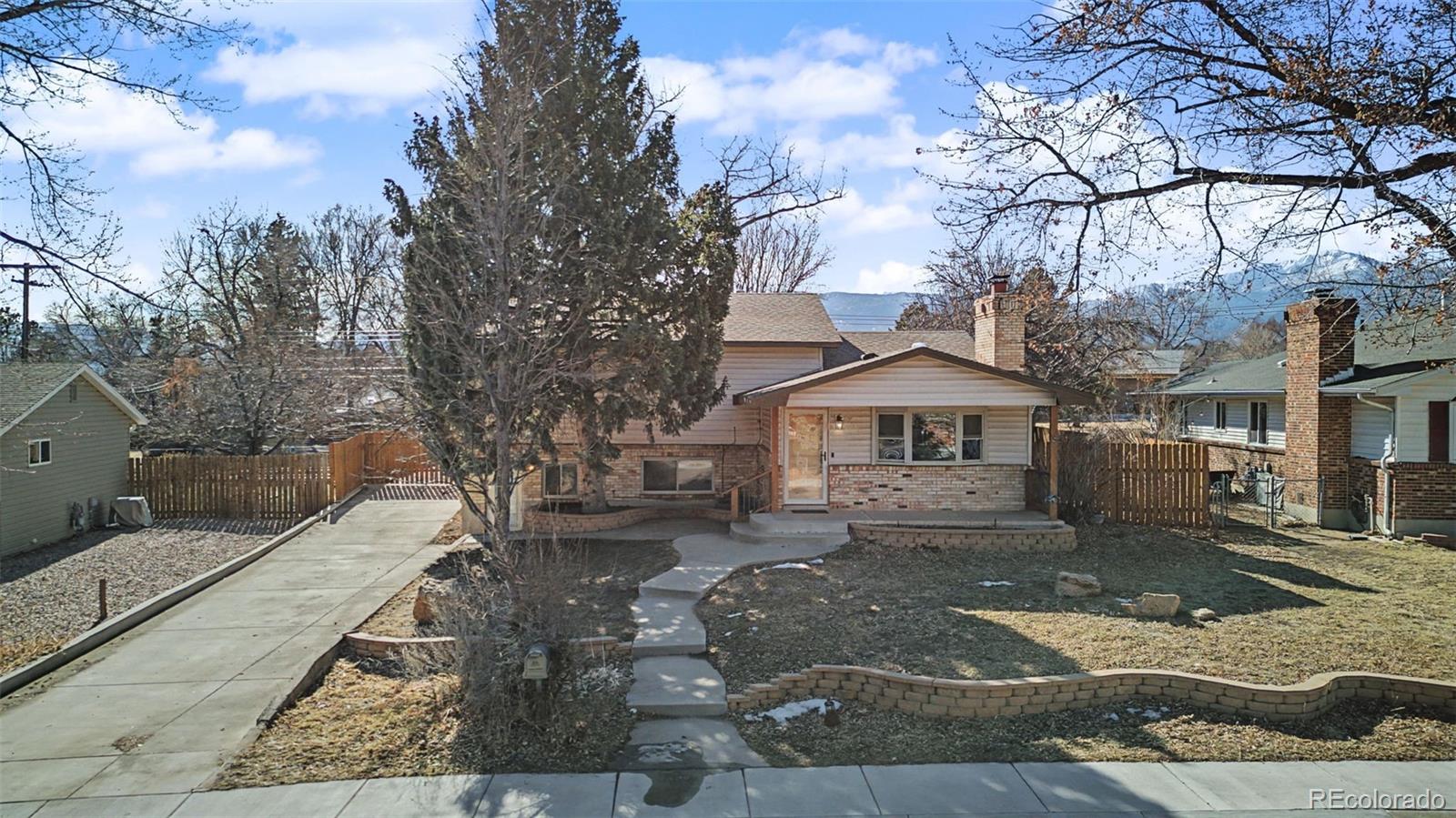 Holland Park Colorado Springs Home | MLS #: 8712633711  Hoorne Avenue, Colorado Springs Beds: 4 Baths: 2 Price: $460,000