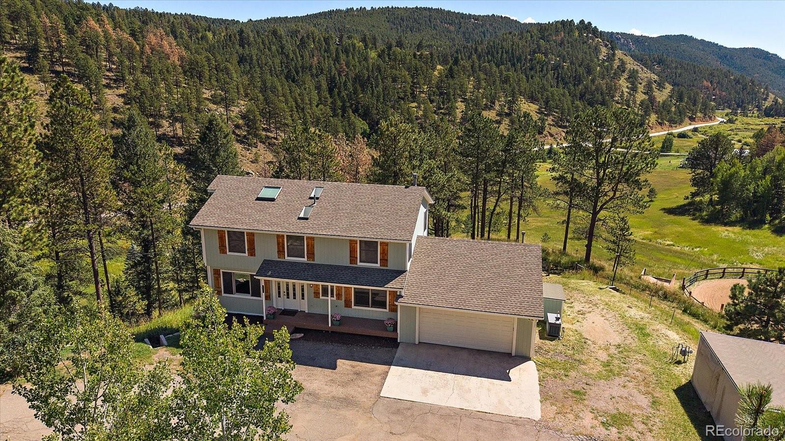 Conifer Meadows Conifer Home | MLS #: 575354711842  GERONIMO Trail, Conifer Beds: 4 Baths: 4 Price: $868,000
