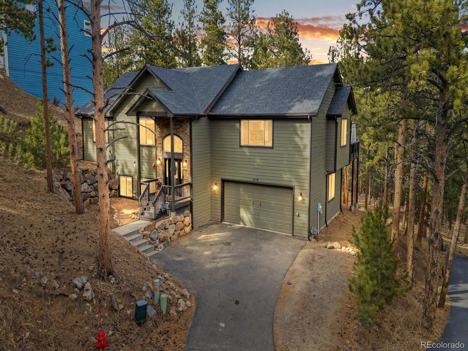  Evergreen Home | MLS #: 90714173109  Moonshadow Lane, Evergreen Beds: 4 Baths: 3 Price: $1,124,000
