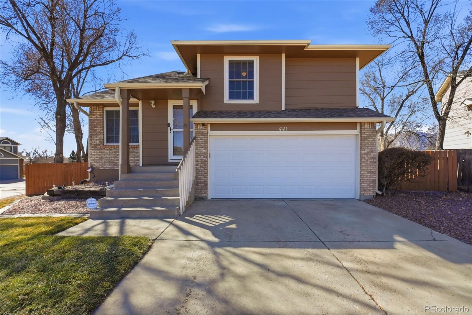 Fountain Valley Colorado Springs Home | MLS #: 9794843441  Pucket Circle, Colorado Springs Beds: 4 Baths: 3 Price: $400,000