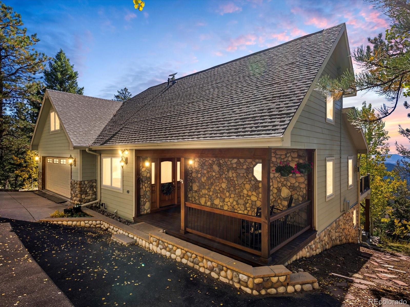  Conifer Home | MLS #: 933329411630  Baca Road, Conifer Beds: 4 Baths: 4 Price: $925,000