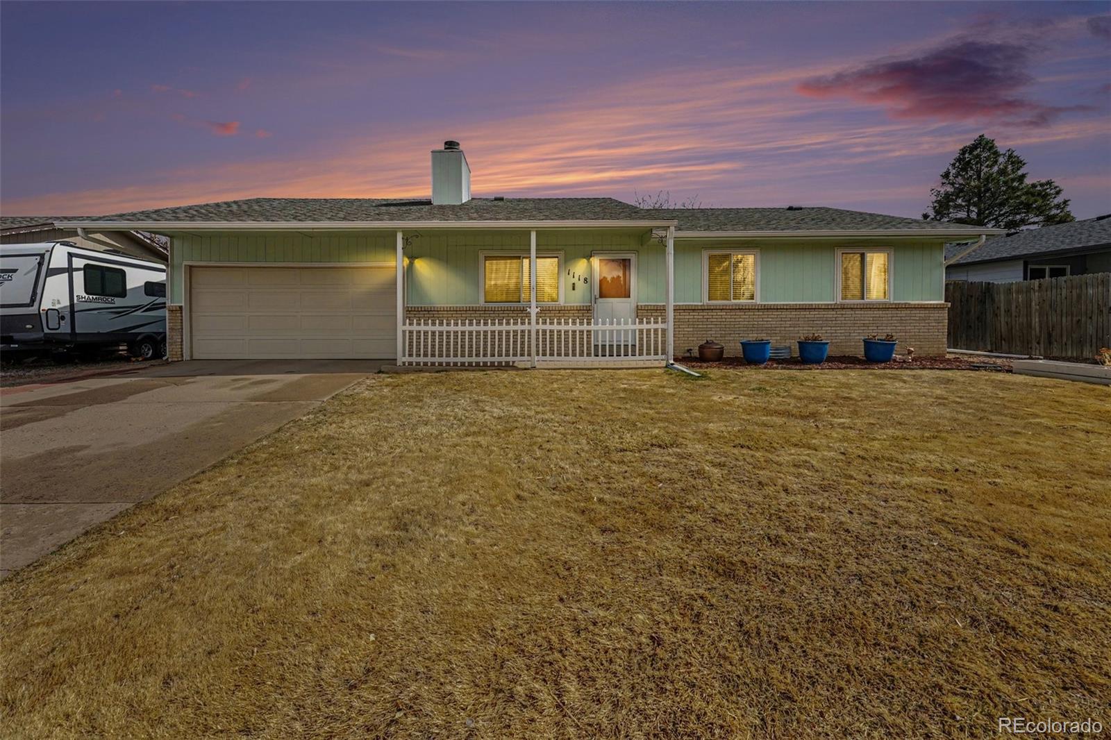 Mesa Aurora Home | MLS #: 56013411118  Mobile Street, Aurora Beds: 4 Baths: 3 Price: $450,000