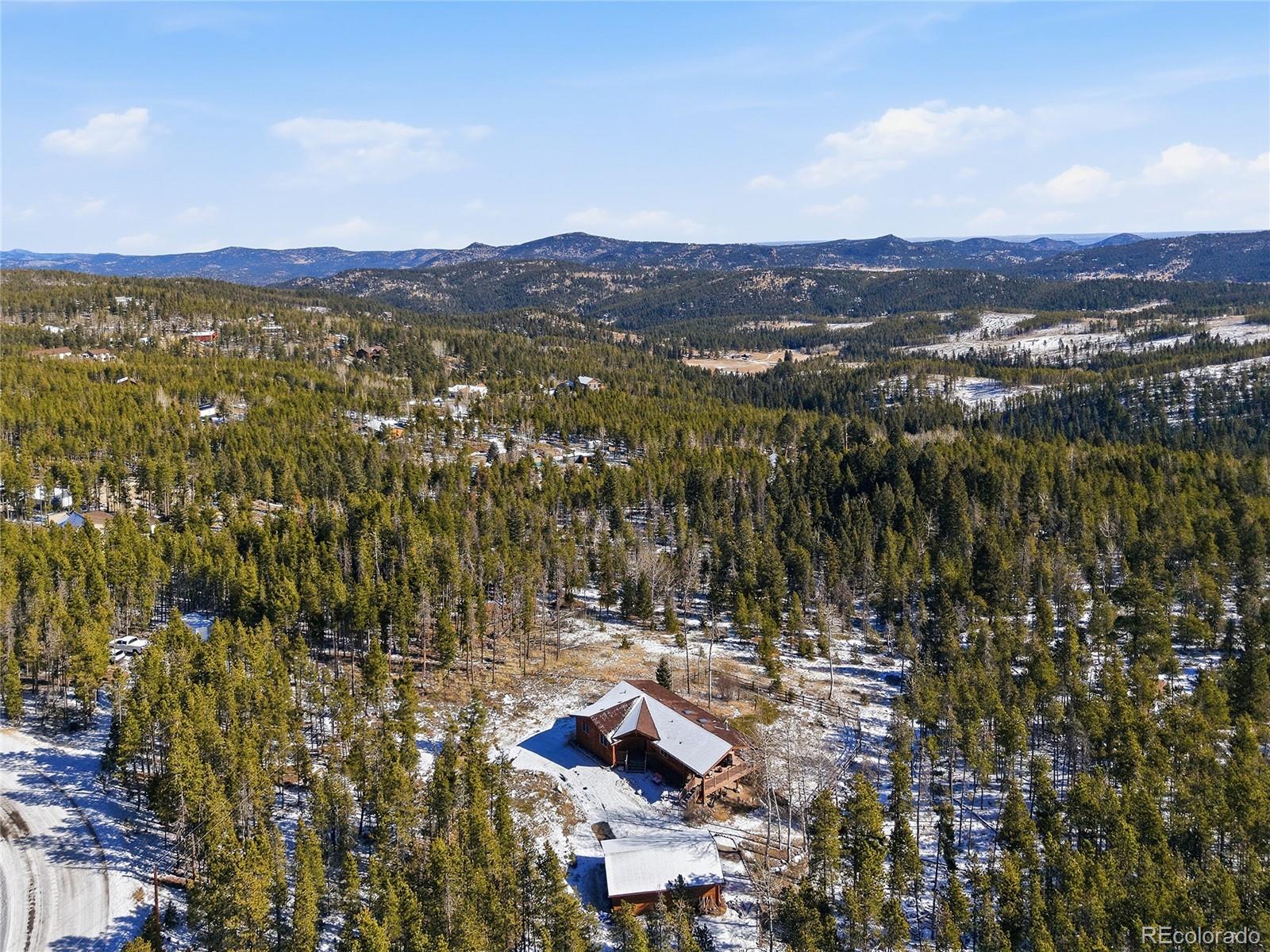  Conifer Home | MLS #: 64463848790 S Warhawk Road, Conifer Beds: 3 Baths: 2 Price: $780,000