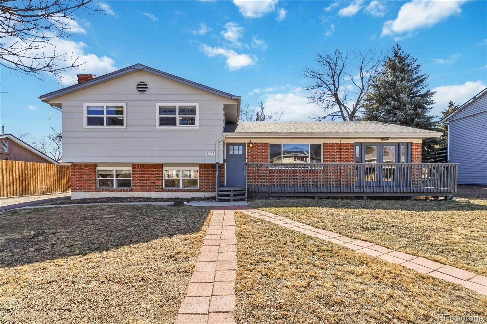 Pikes Peak Park Colorado Springs Home | MLS #: 26848641511  Server Drive, Colorado Springs Beds: 4 Baths: 3 Price: $389,000