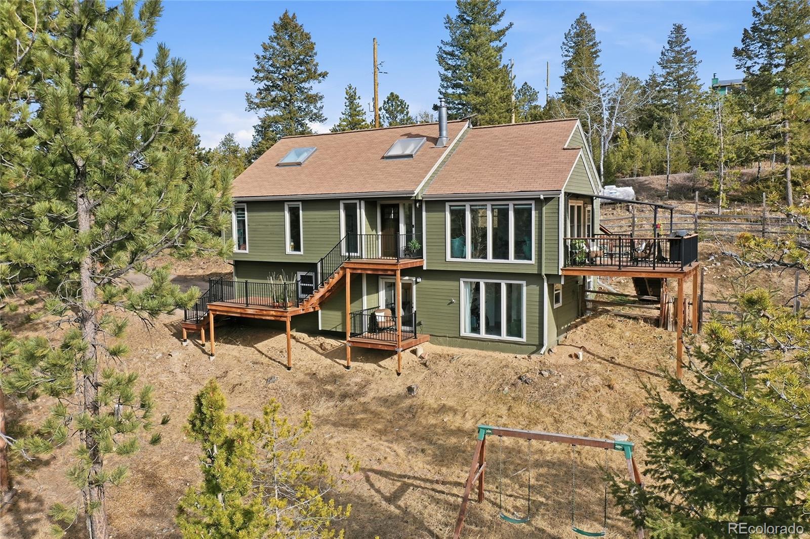Evergreen Valley Estates Evergreen Home | MLS #: 406408330880  Manitoba Drive, Evergreen Beds: 4 Baths: 2 Price: $760,000