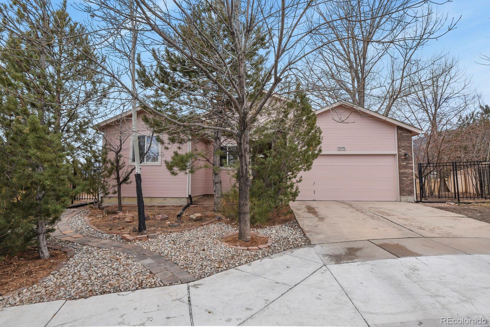 Crown Hill Mesa Colorado Springs Home | MLS #: 69977291595 W Costilla Street, Colorado Springs Beds: 5 Baths: 3 Price: $610,000