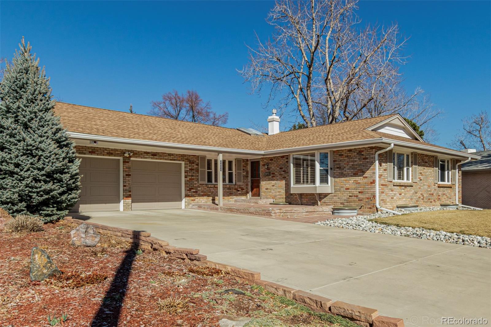Holly Hills Denver Home | MLS #: 98798212424 S Jasmine Street, Denver Beds: 5 Baths: 3 Price: $825,000