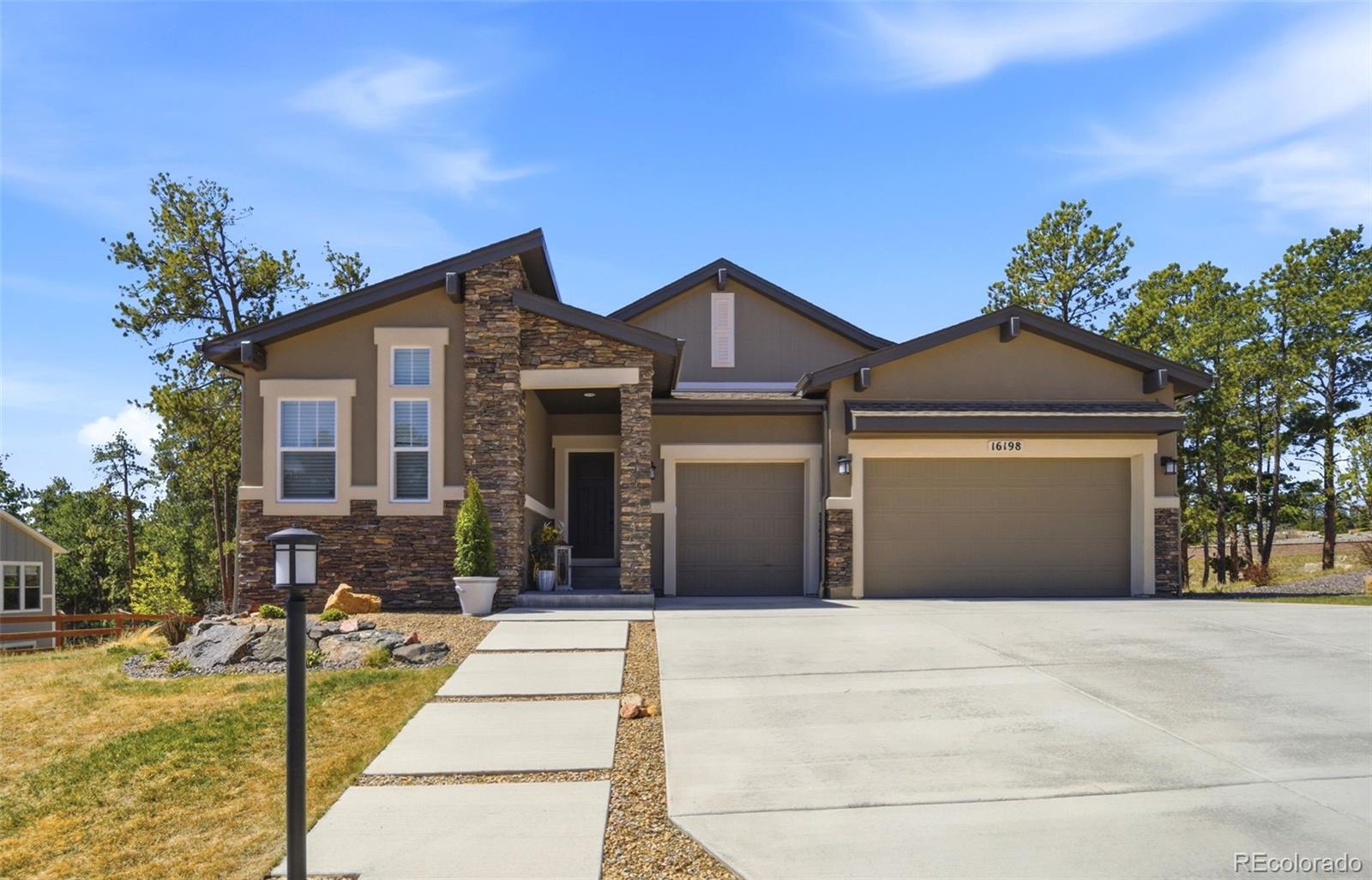  Monument Home | MLS #: 438158816198  Sunset Splendor Lane, Monument Beds: 4 Baths: 3 Price: $1,200,000