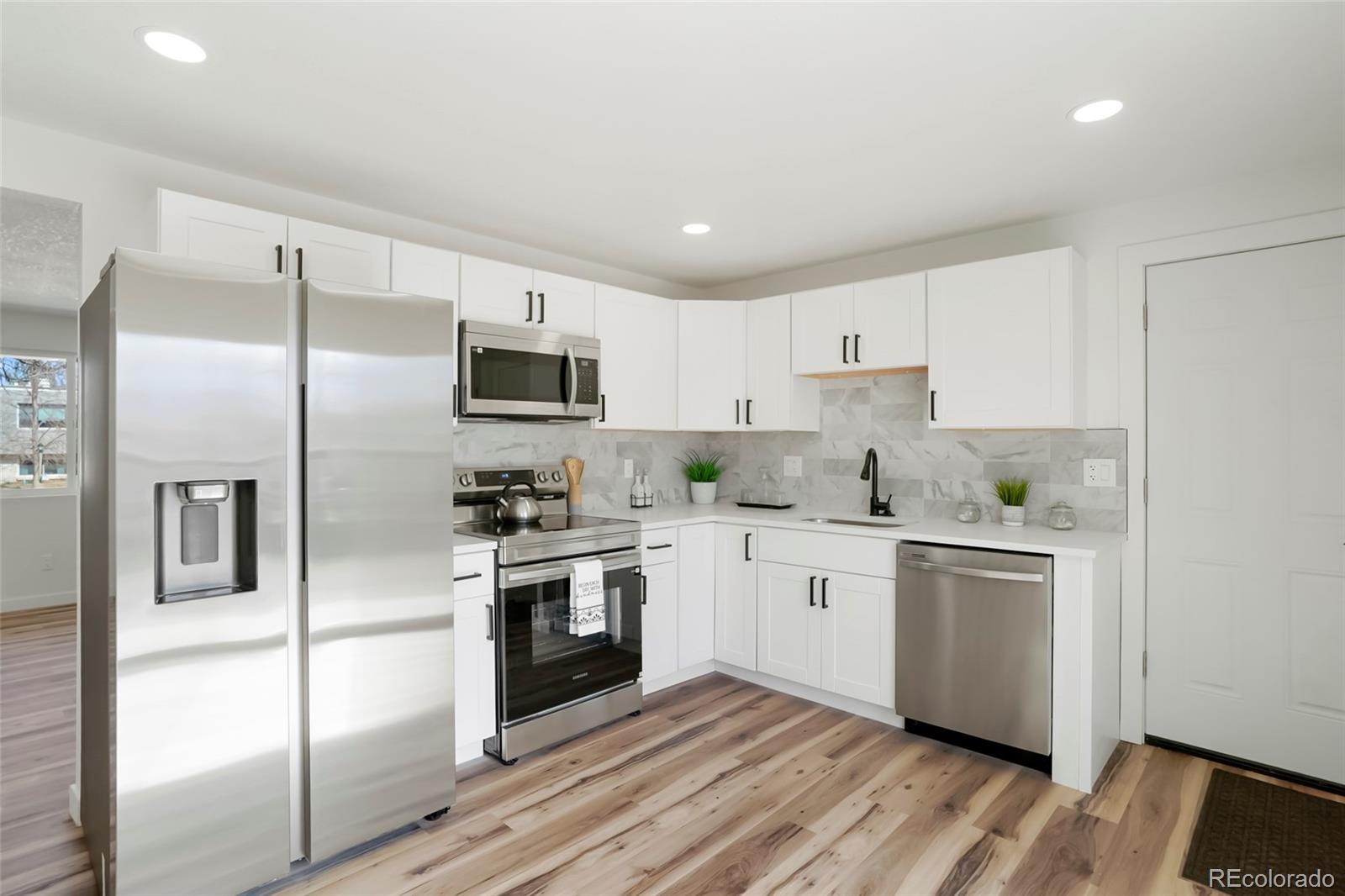 Longmont Estates Longmont Home | MLS #: 639158723  University Drive, Longmont Beds: 4 Baths: 4 Price: $589,900