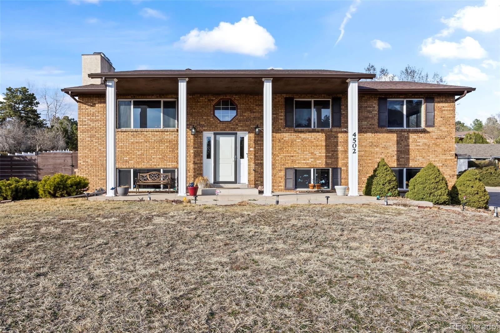 Oaks Colorado Springs Home | MLS #: 42619884502  Constitution Avenue, Colorado Springs Beds: 4 Baths: 3 Price: $425,000