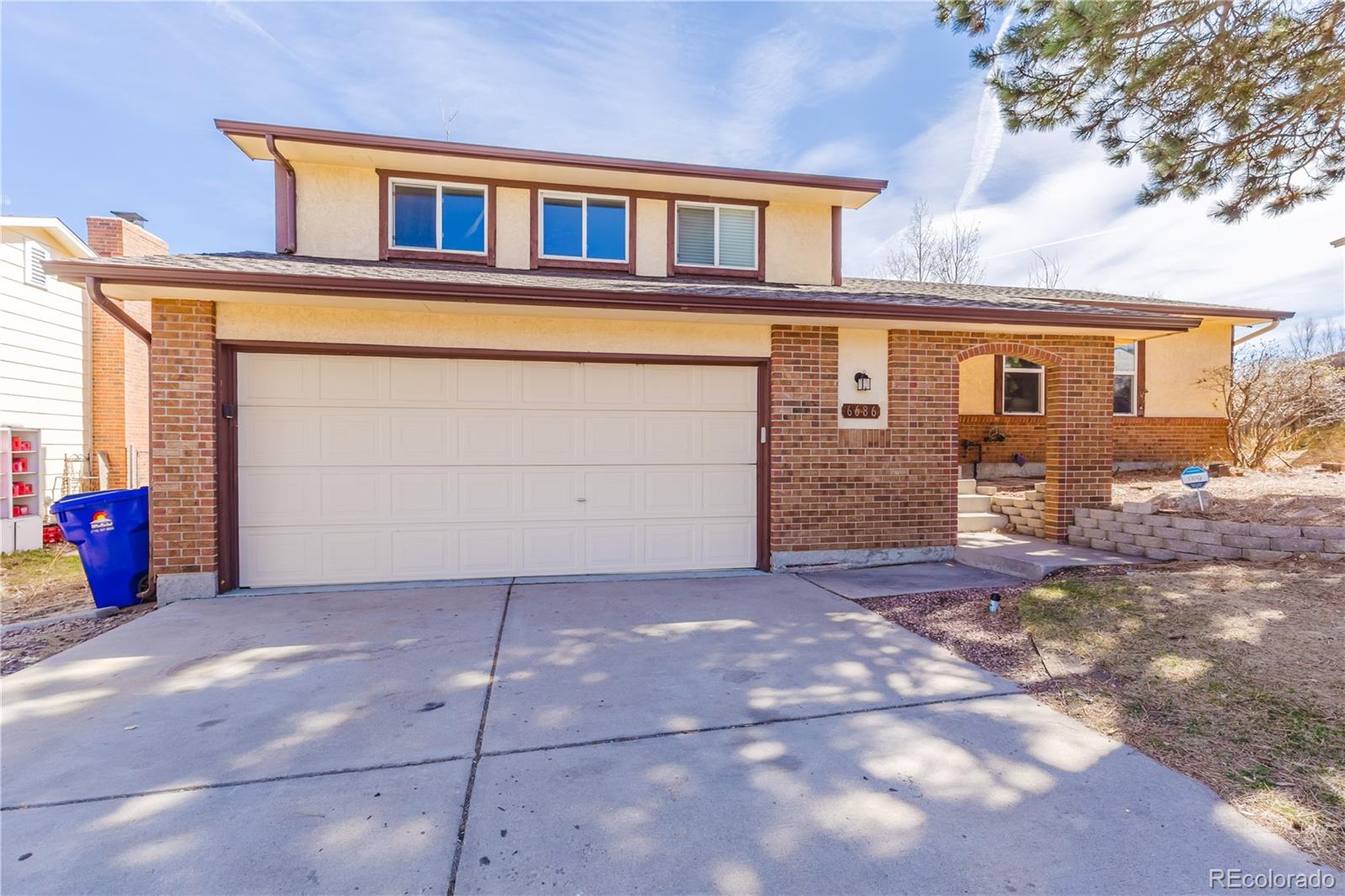 Vista Grande Colorado Springs Home | MLS #: 86532526686  Lange Circle, Colorado Springs Beds: 4 Baths: 3 Price: $430,000