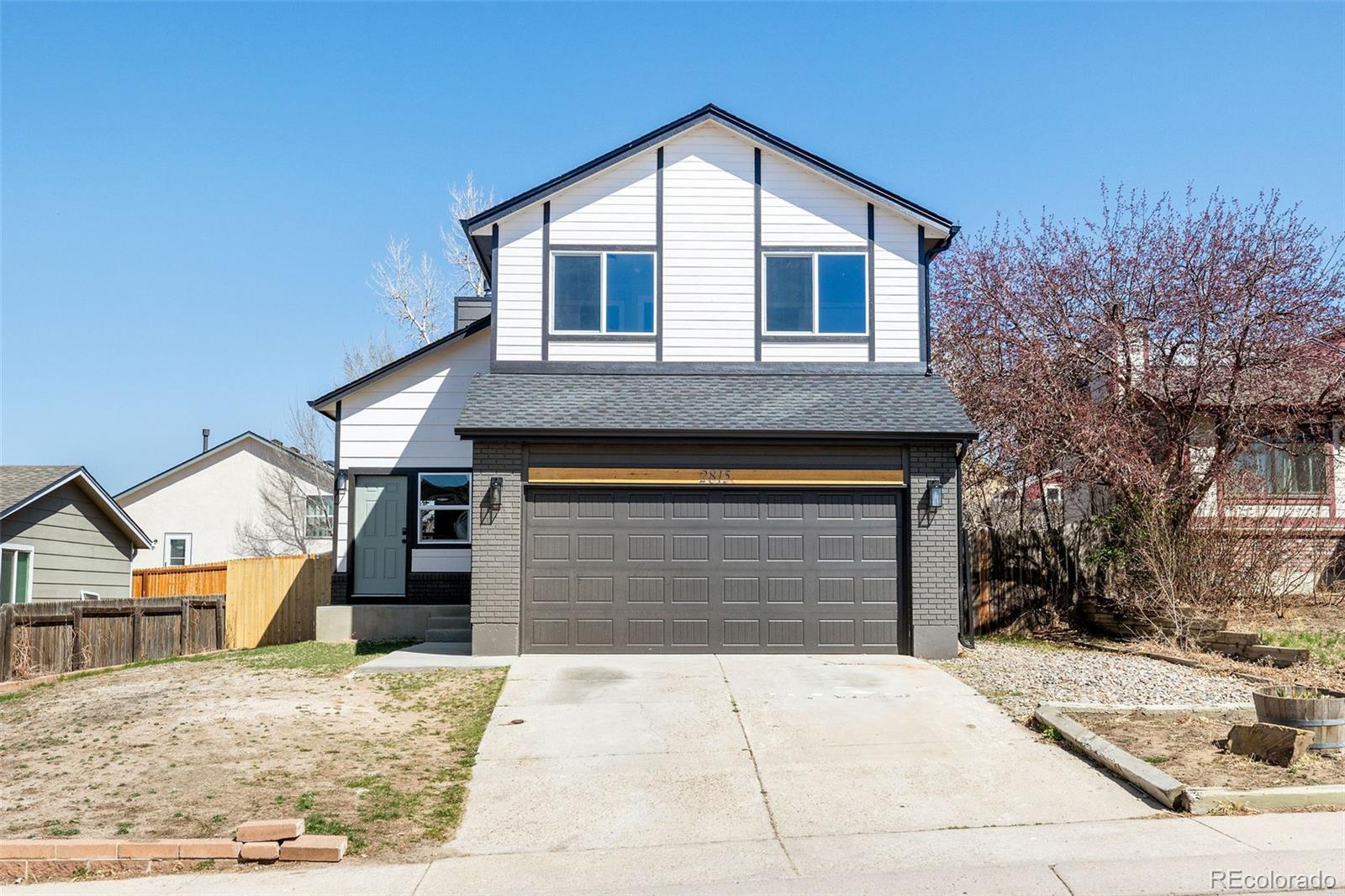 Constitution Hills Colorado Springs Home | MLS #: 80031432815  Richmond Drive, Colorado Springs Beds: 4 Baths: 3 Price: $425,000
