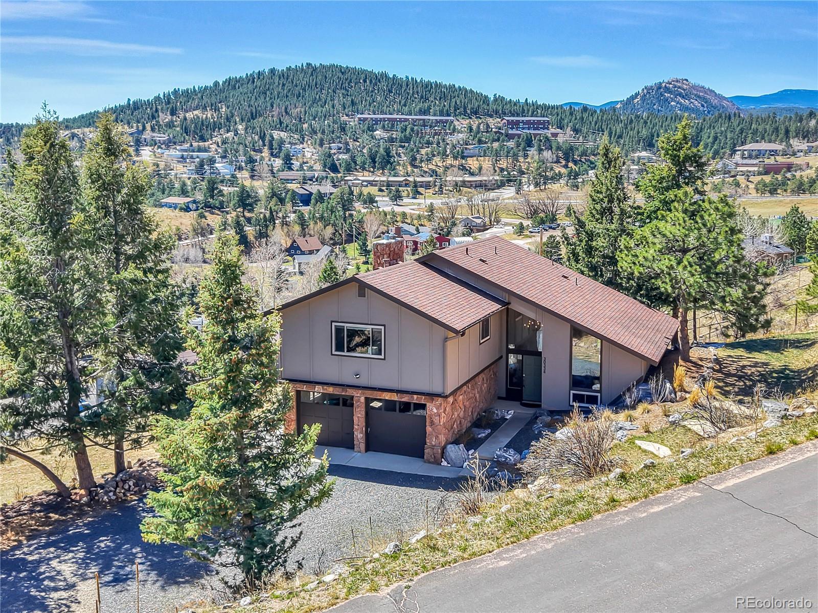  Evergreen Home | MLS #: 685705630334  Roan Drive, Evergreen Beds: 4 Baths: 3 Price: $810,000