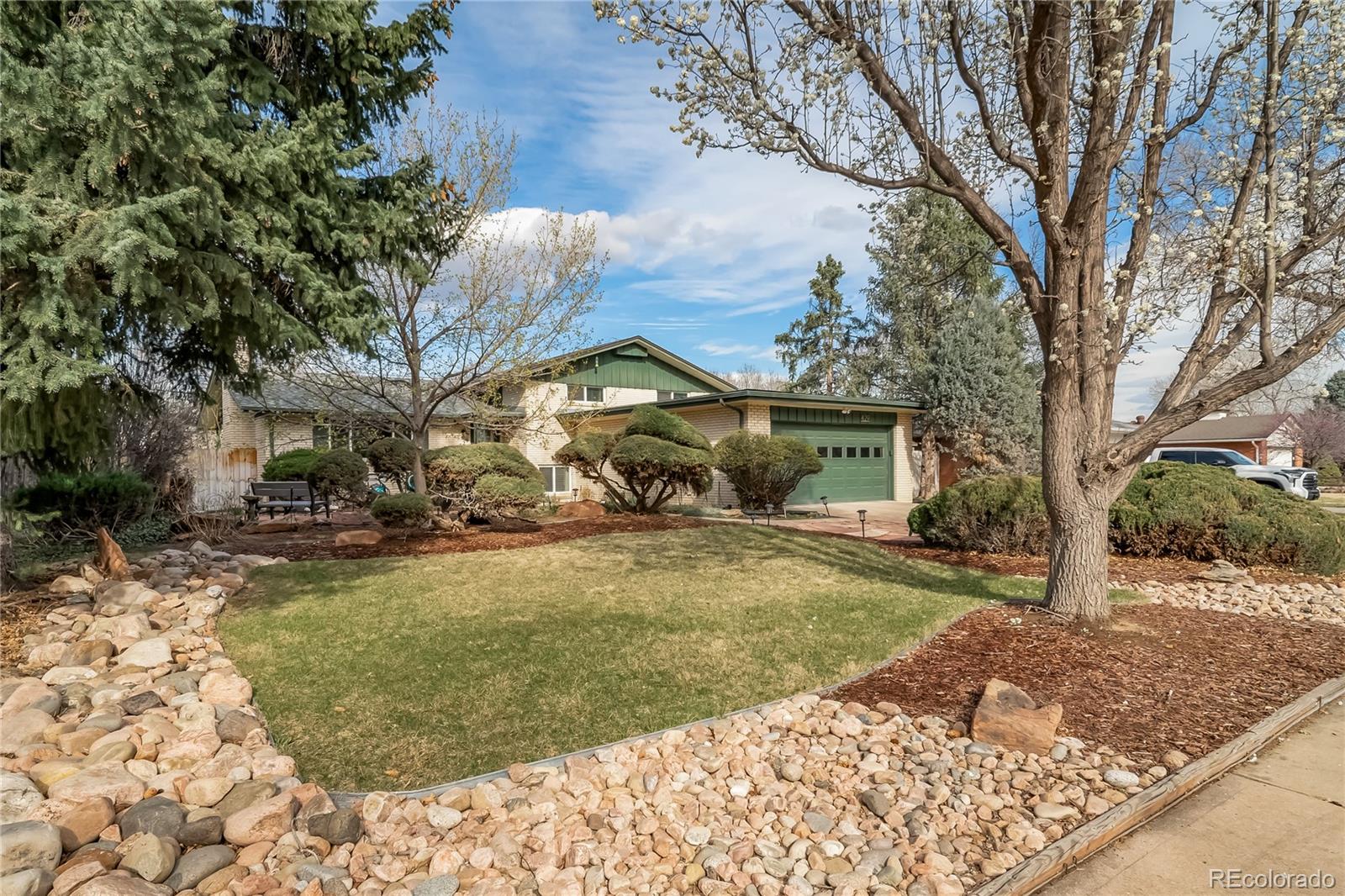 Park East Aurora Home | MLS #: 6741055429  Newark Street, Aurora Beds: 4 Baths: 2 Price: $559,000
