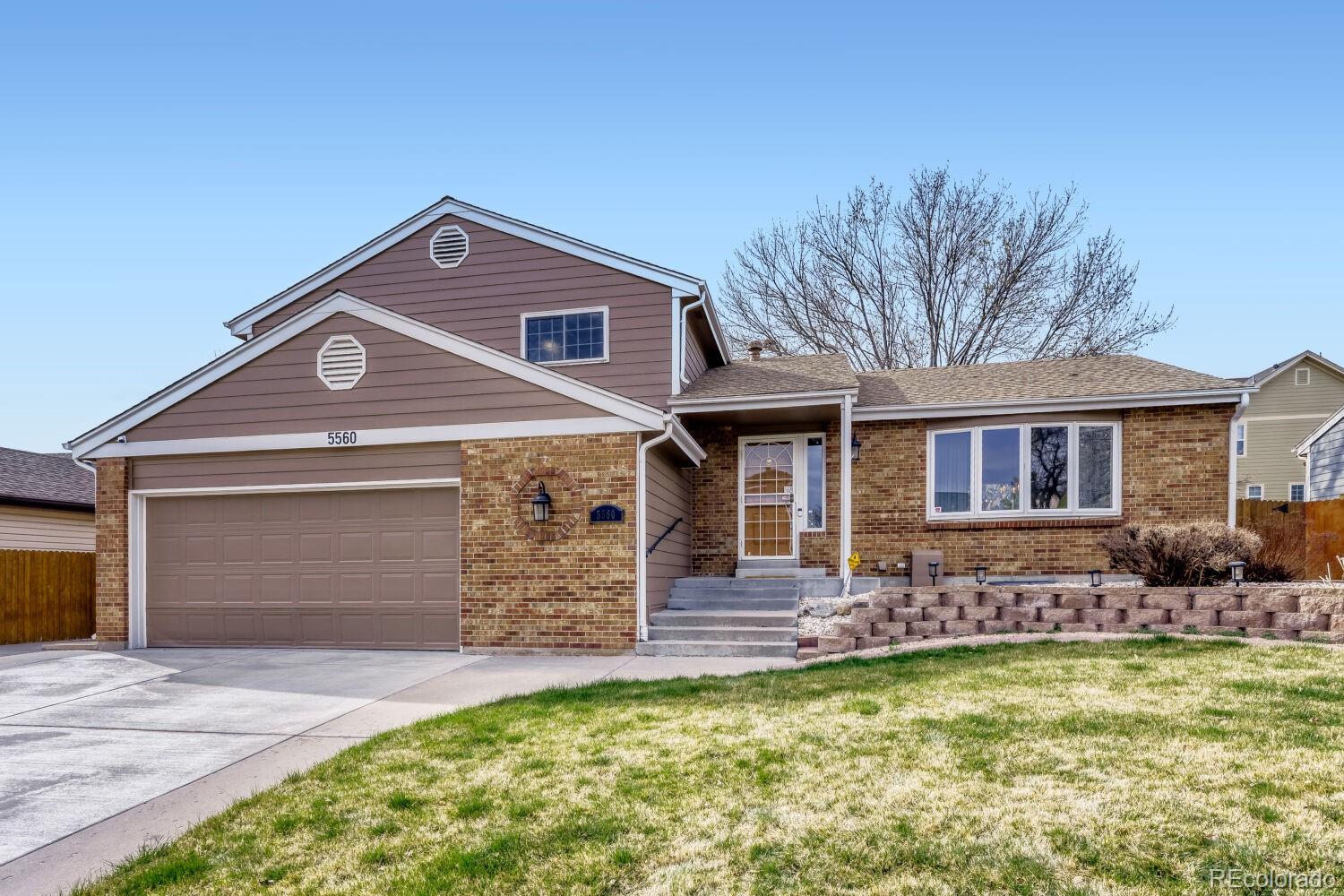 Wood Creek Arvada Home | MLS #: 27465765560 W 74th Avenue, Arvada Beds: 3 Baths: 3 Price: $599,999