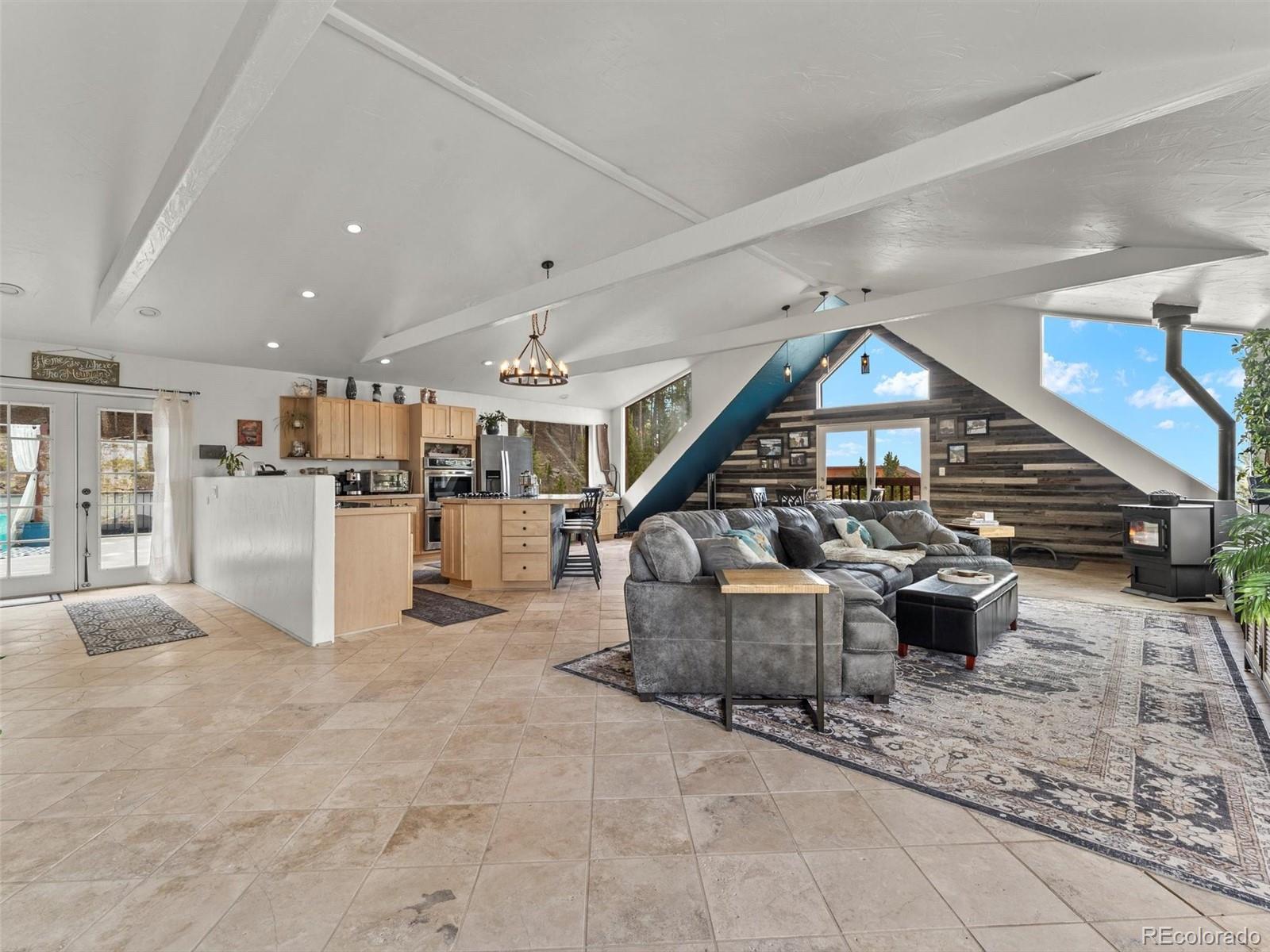 Blue Valley Acres Idaho Springs Home | MLS #: 3043118197  Sawmill Lane, Idaho Springs Beds: 2 Baths: 3 Price: $774,900
