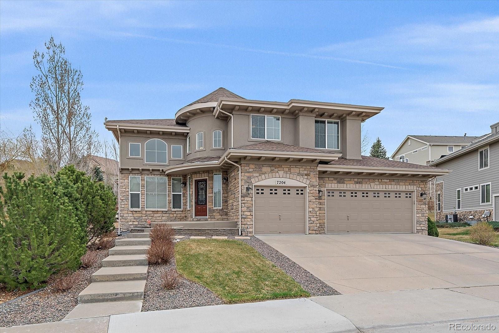 Saddle Rock Aurora Home | MLS #: 54296637204 S Ukraine Street, Aurora Beds: 4 Baths: 4 Price: $815,000
