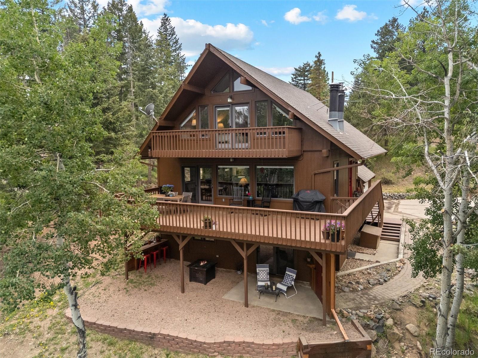  Evergreen Home | MLS #: 690339432462  Lodgepole Drive, Evergreen Beds: 5 Baths: 3 Price: $940,000