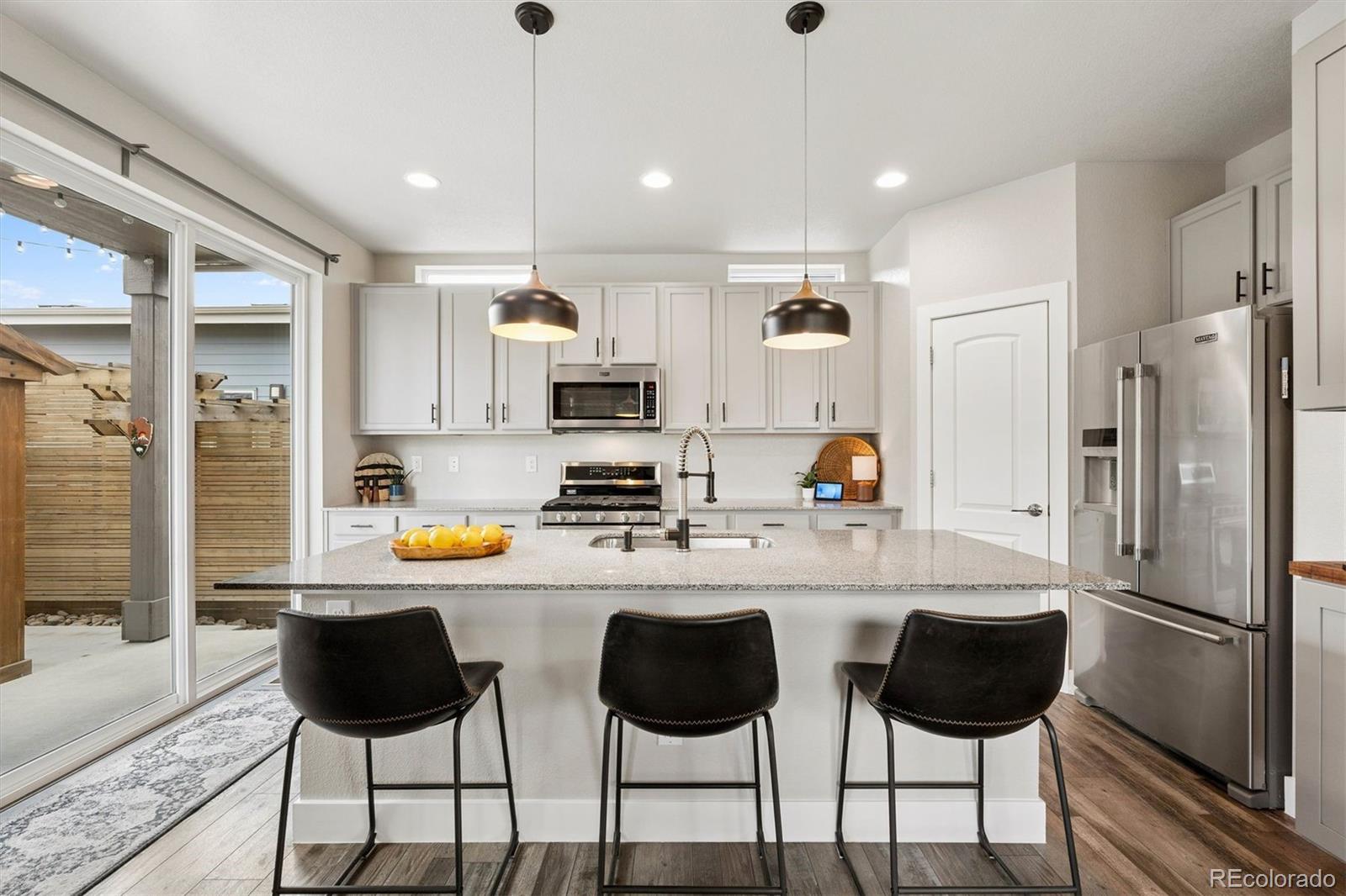 Central Park Denver Home | MLS #: 90287425870  Boston Street, Denver Beds: 4 Baths: 4 Price: $815,000