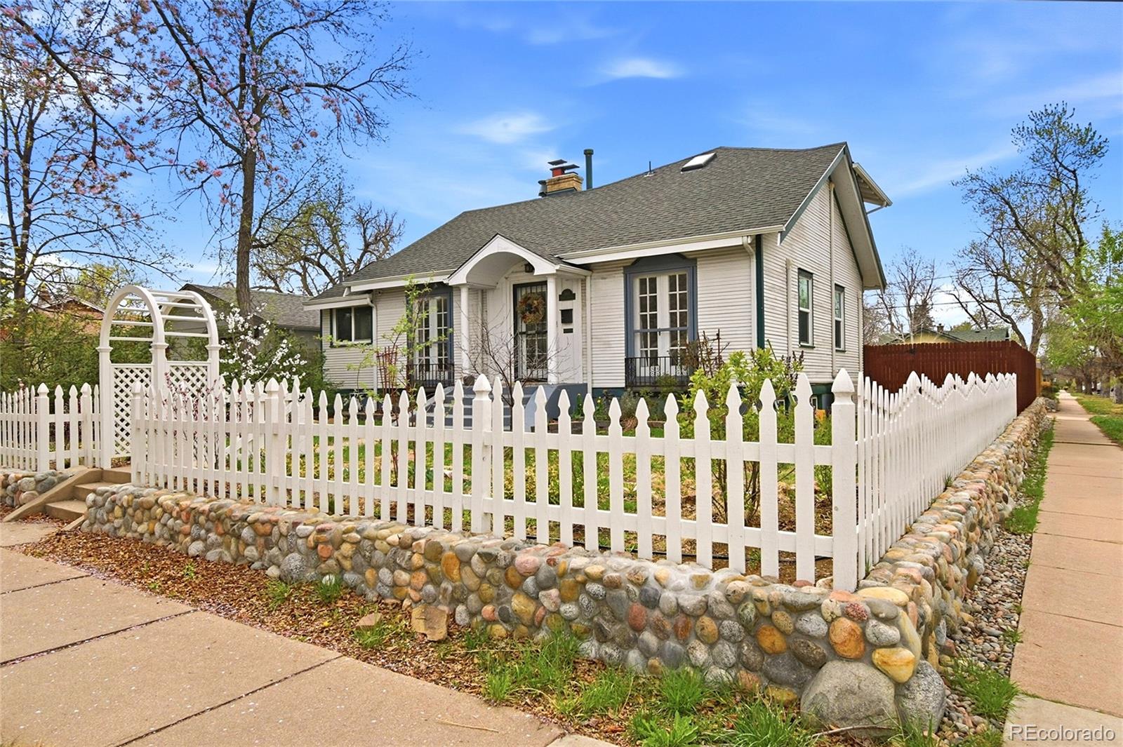  Denver Home | MLS #: 48809991801 S Downing Street, Denver Beds: 4 Baths: 3 Price: $899,000