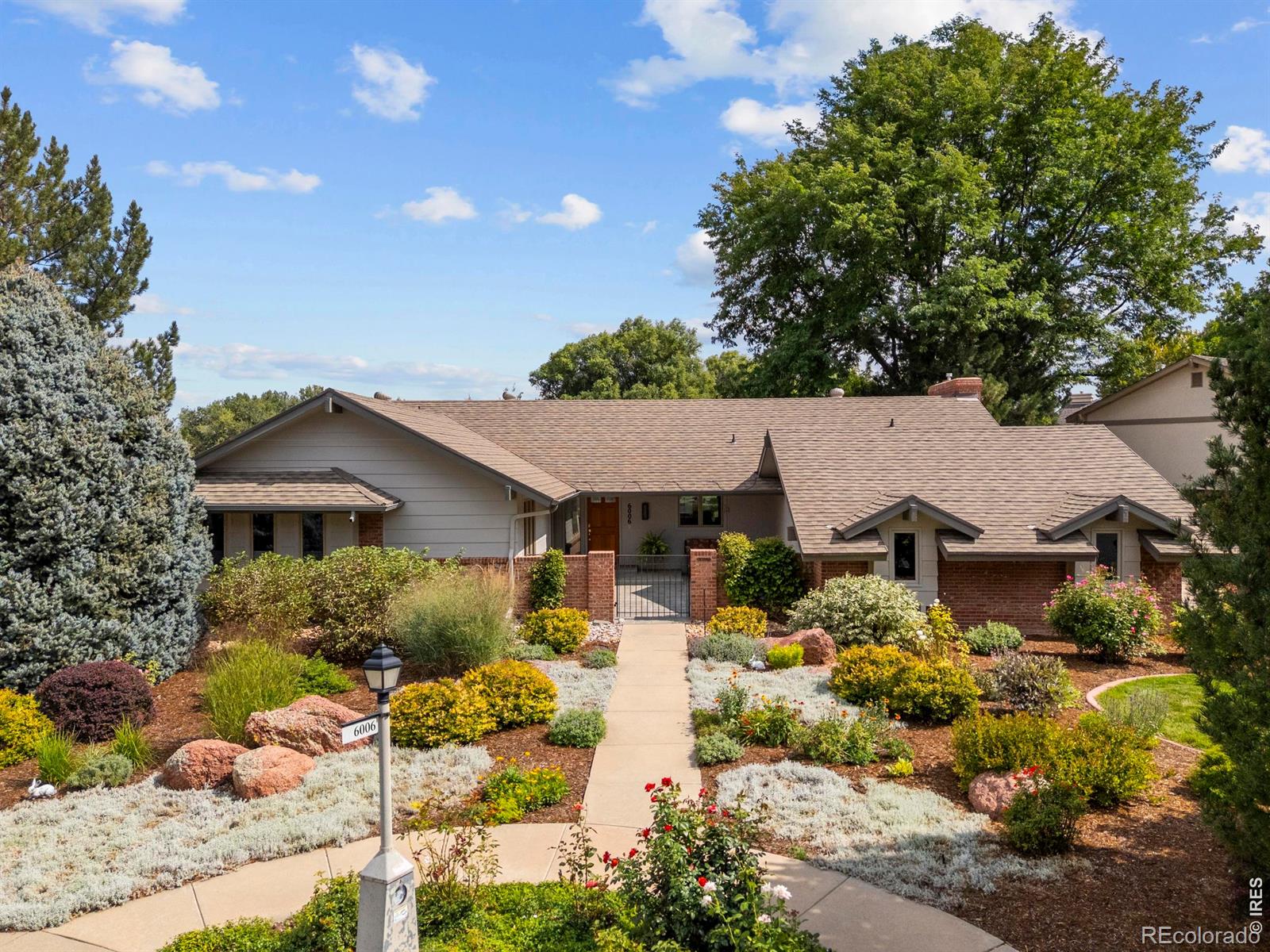  Longmont Home | MLS #: 45678910555216006  Fox Hill Drive, Longmont Beds: 3 Baths: 3 Price: $900,000