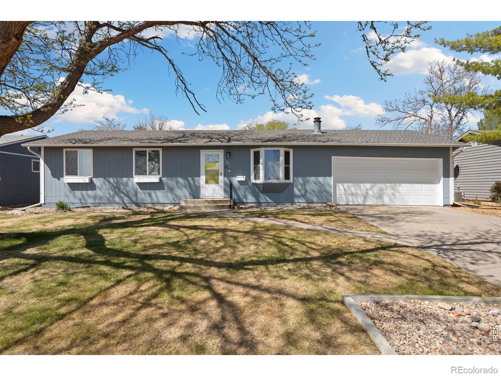 Sunset Acres Loveland Home | MLS #: 45678910560423411 N Douglas Avenue, Loveland Beds: 4 Baths: 2 Price: $435,000