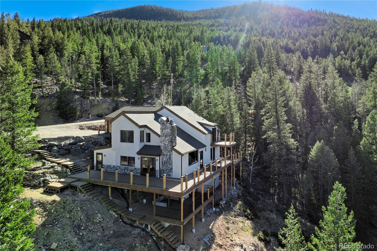  Evergreen Home | MLS #: 519299585  Santa Fe Mtn Road, Evergreen Beds: 4 Baths: 3 Price: $1,025,000