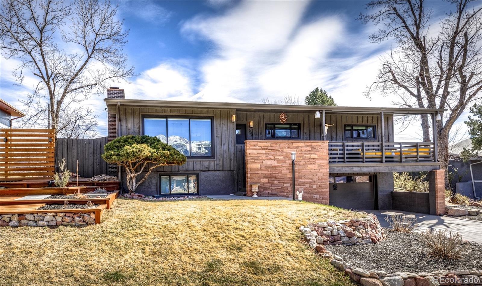 Pleasant Valley Colorado Springs Home | MLS #: 2452723609  Pioneer Lane, Colorado Springs Beds: 4 Baths: 3 Price: $669,900