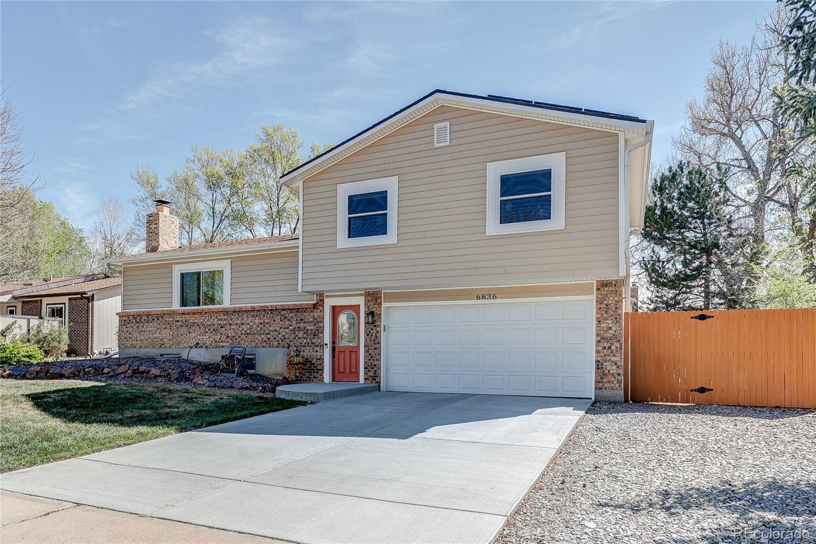 Ralston Valley Arvada Home | MLS #: 90848936836  Coors Court, Arvada Beds: 3 Baths: 3 Price: $600,000