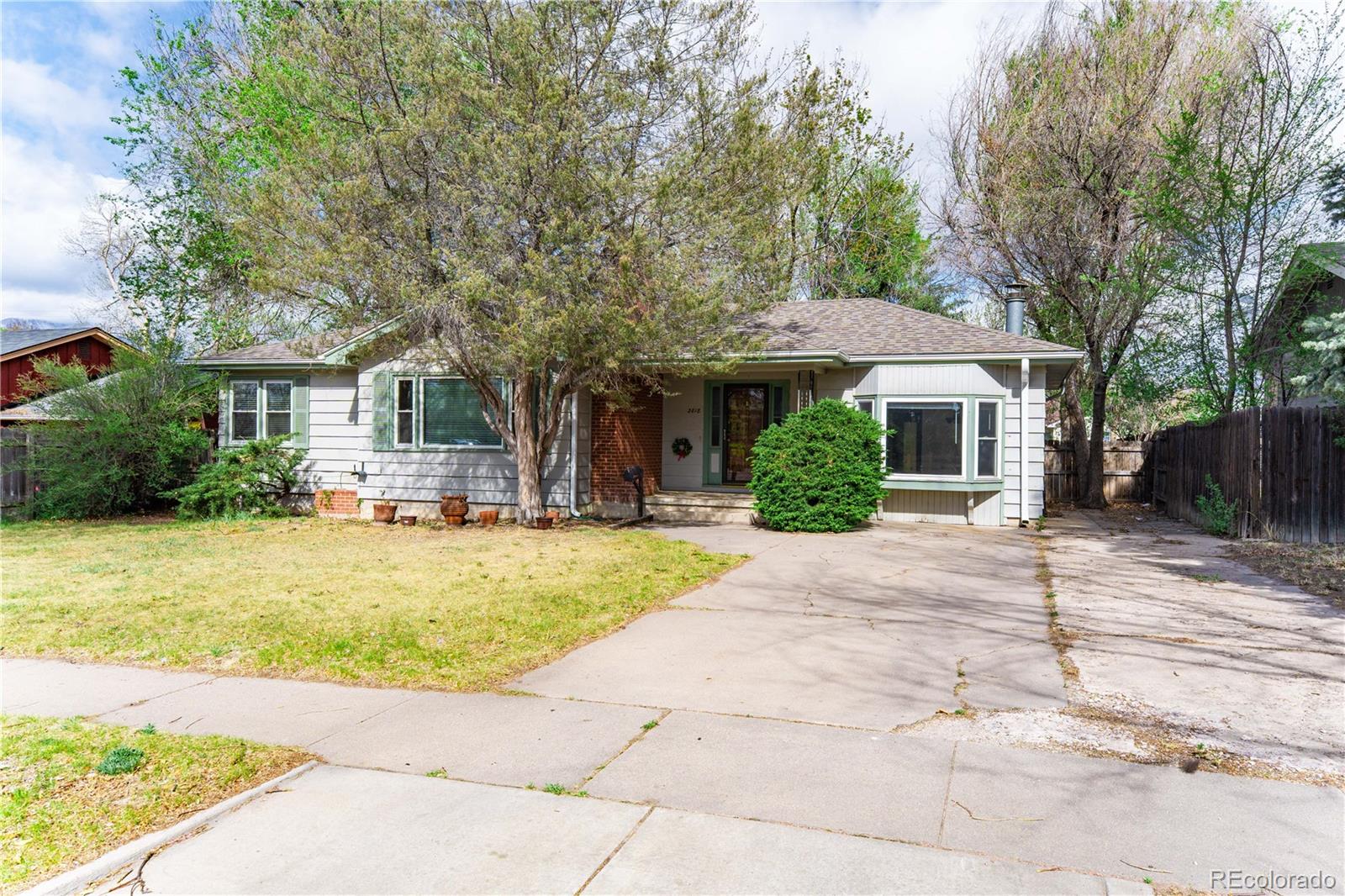 Austin Heights Colorado Springs Home | MLS #: 38643412818  Templeton Gap Road, Colorado Springs Beds: 5 Baths: 2 Price: $350,000