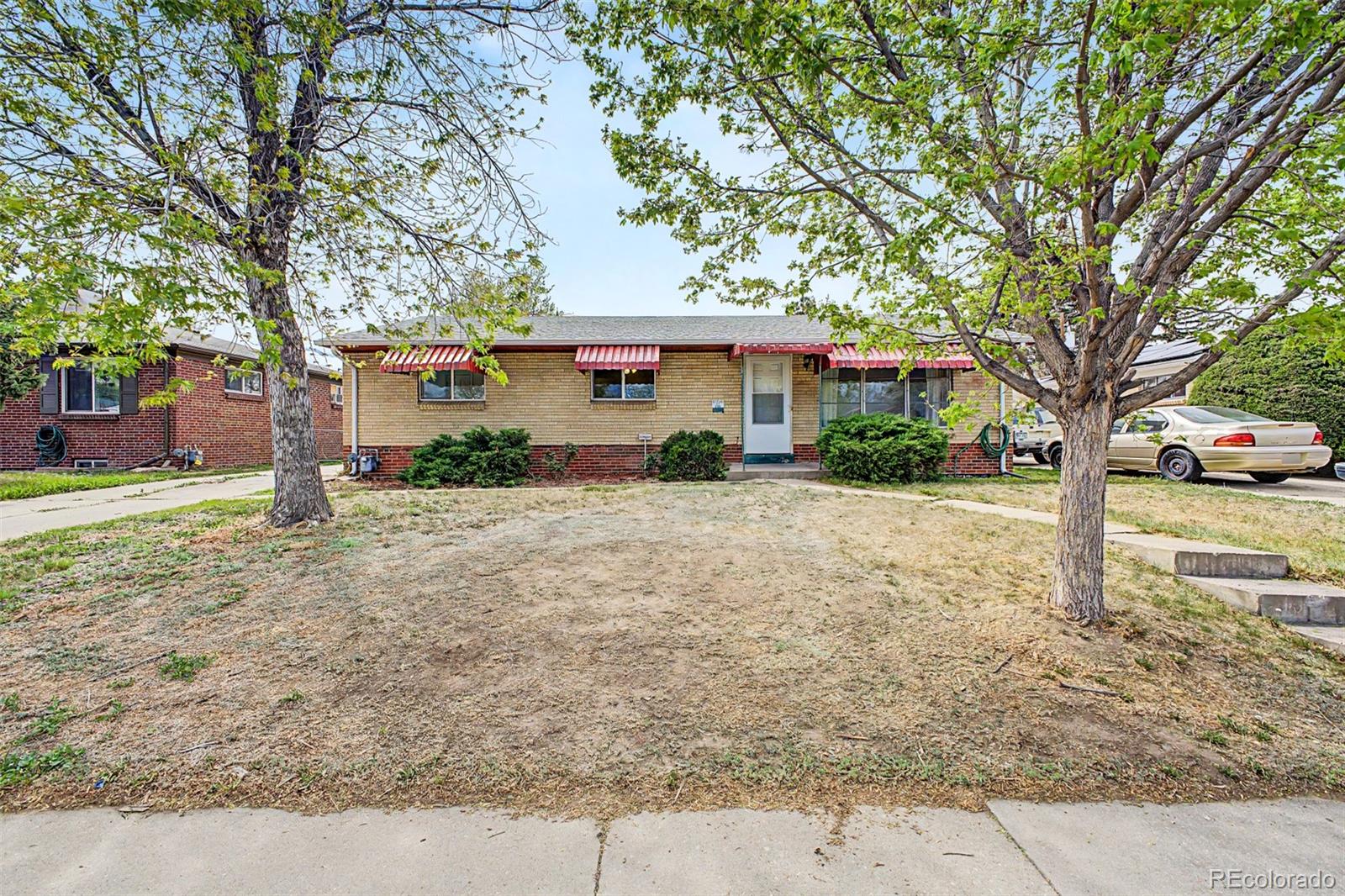 Sunnyvale Aurora Home | MLS #: 5414375565  Florence Street, Aurora Beds: 5 Baths: 2 Price: $440,000