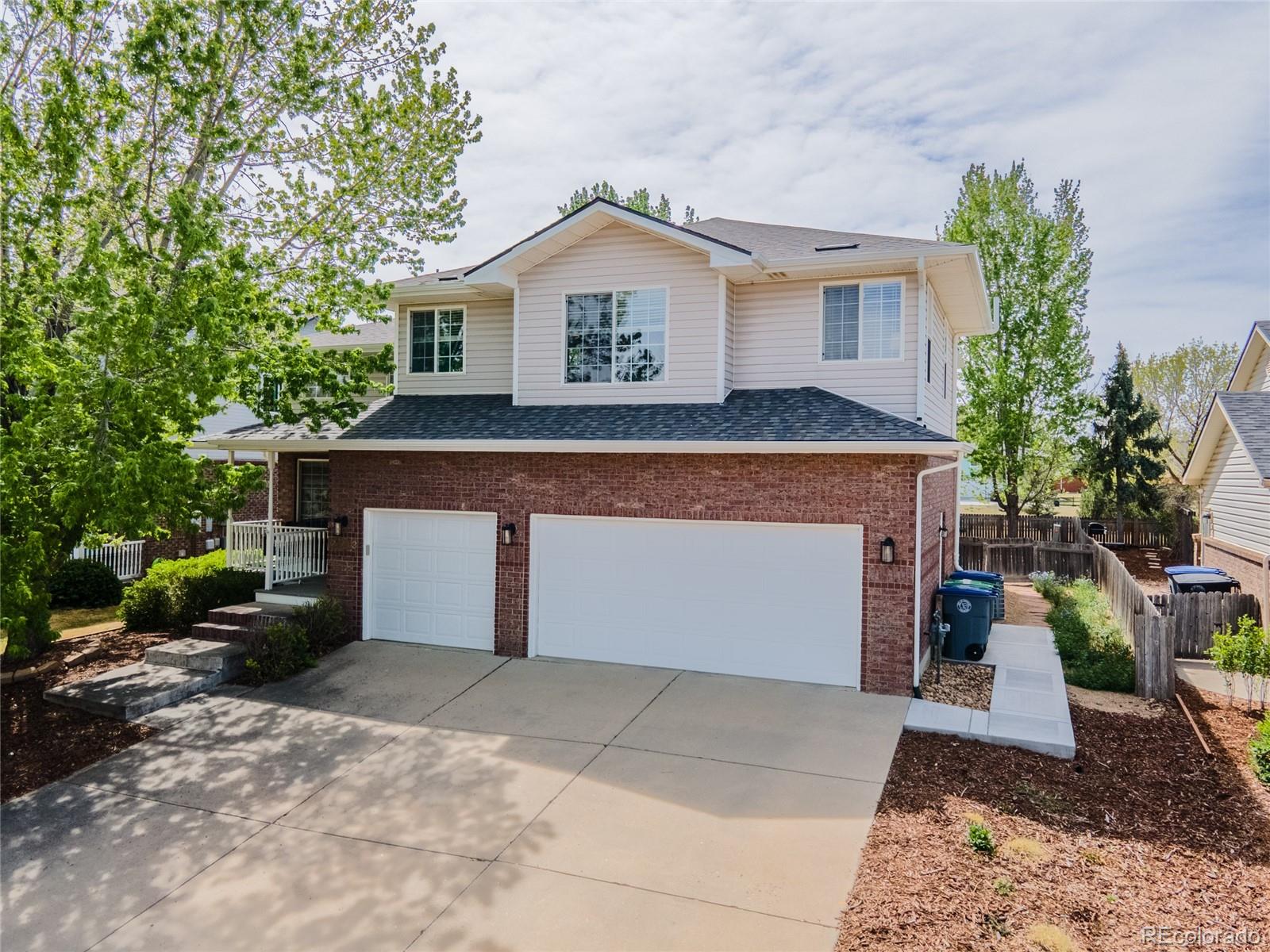  Longmont Home | MLS #: 85722182513  Falcon Drive, Longmont Beds: 4 Baths: 3 Price: $675,000