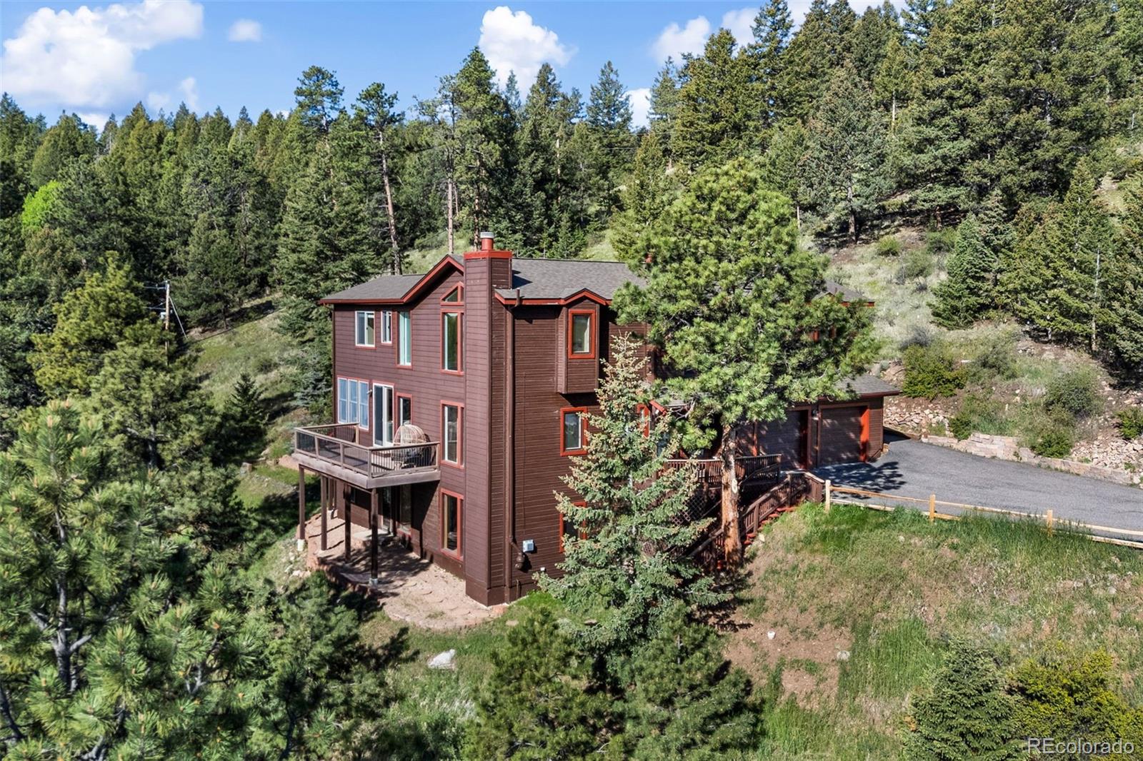 Valley Hi Evergreen Home | MLS #: 930040127822  Bonanza Drive, Evergreen Beds: 4 Baths: 4 Price: $1,124,000