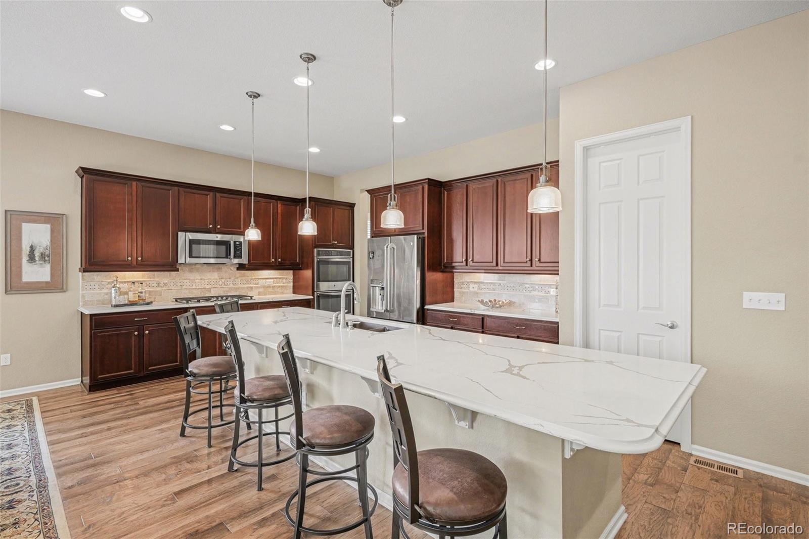  Aurora Home | MLS #: 164691826534 E Links Place, Aurora Beds: 4 Baths: 3 Price: $700,000