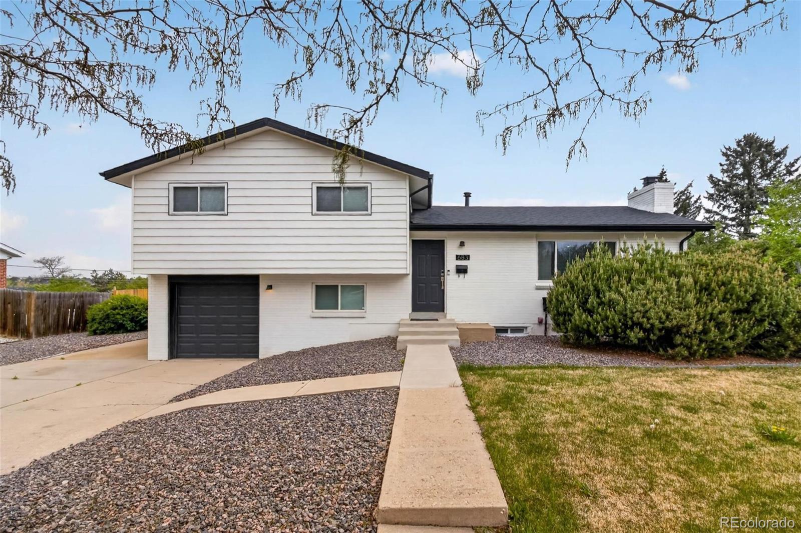 Chambers Heights Aurora Home | MLS #: 5633382683  Dawson Street, Aurora Beds: 4 Baths: 2 Price: $485,000