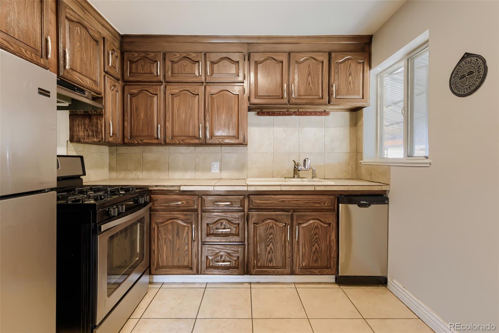 Barnum West Denver Home | MLS #: 6336494566  Wolff Street, Denver Beds: 4 Baths: 2 Price: $380,000