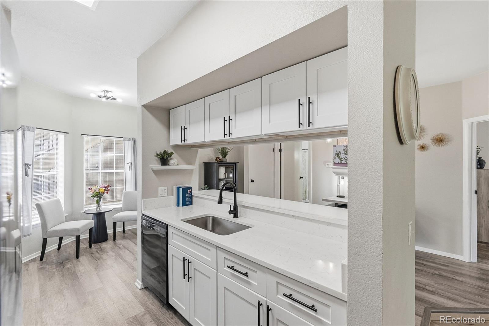 Miralago Littleton Condo / Townhome | MLS #: 46393394760 S Wadsworth Boulevard H107, Littleton Beds: 1 Baths: 1 Price: $279,950