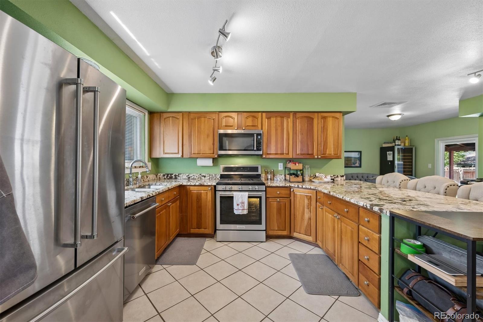 Montbello Denver Home | MLS #: 70195884493 N Auckland Court, Denver Beds: 3 Baths: 2 Price: $469,900