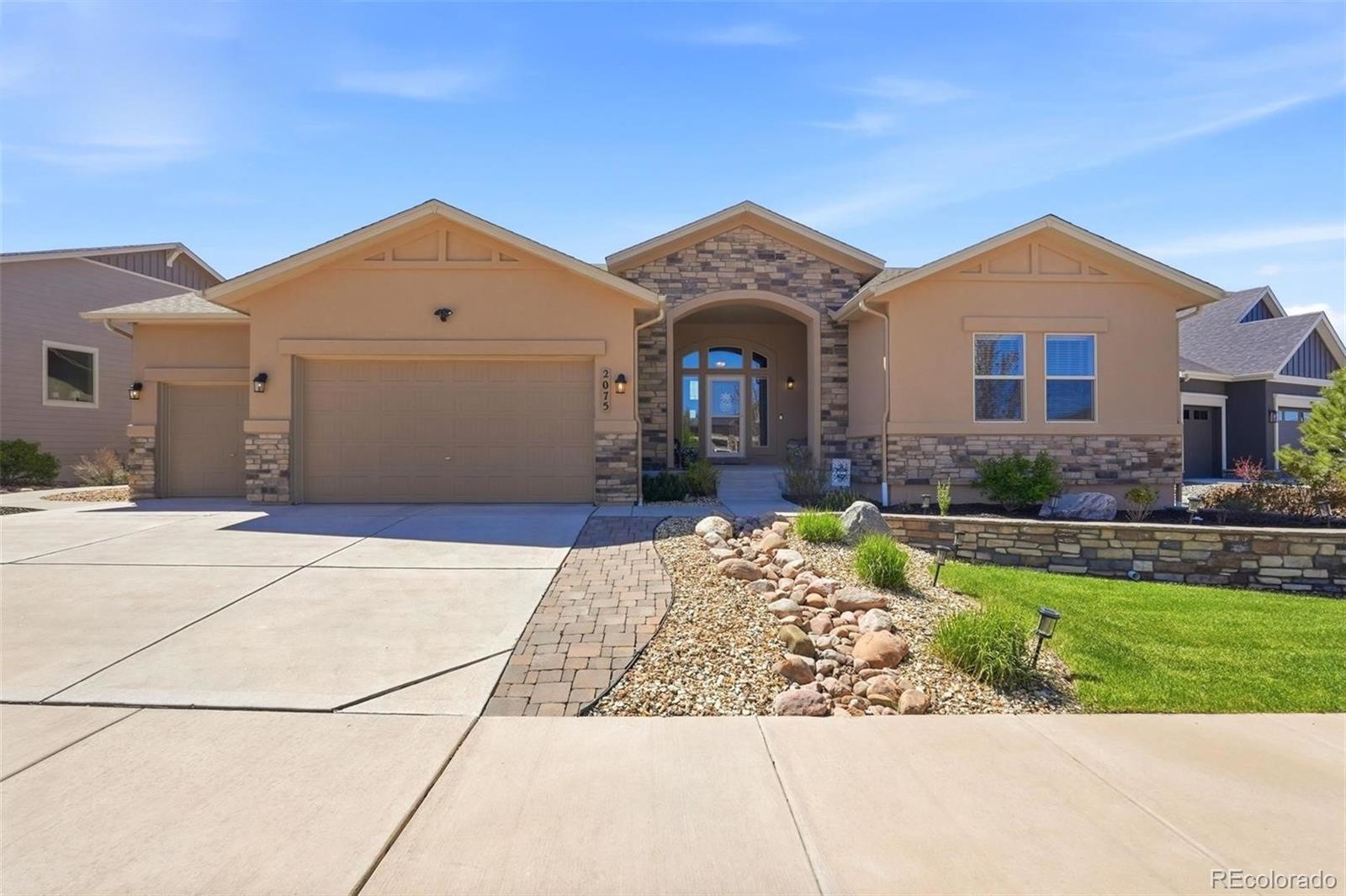 Flying Horse Colorado Springs Home | MLS #: 73819652075  Ever Red Court, Colorado Springs Beds: 5 Baths: 4 Price: $985,000