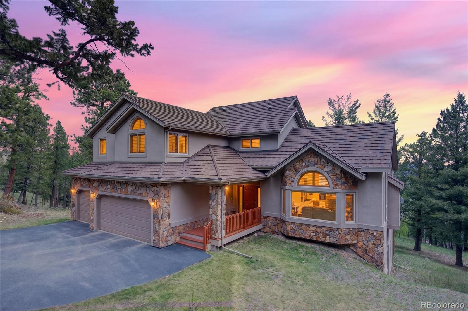  Evergreen Home | MLS #: 84175731856  Santa Fe Mountain Road, Evergreen Beds: 4 Baths: 4 Price: $1,275,000