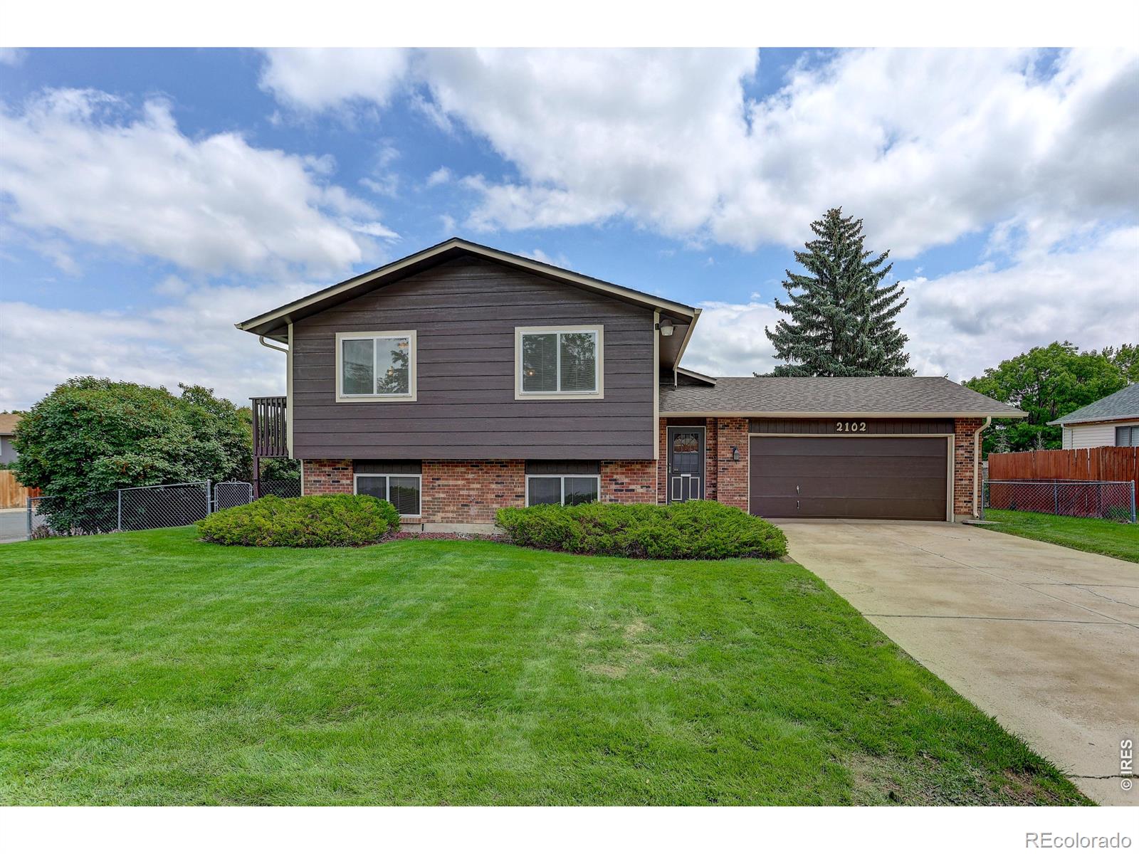 Sherri Mar Loveland Home | MLS #: 45678910597262102 S Custer Avenue, Loveland Beds: 4 Baths: 2 Price: $450,000