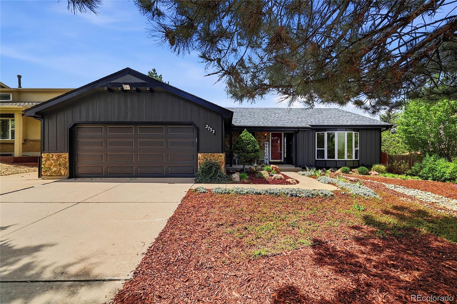  Colorado Springs Home | MLS #: 21001372733  Purgatory Drive, Colorado Springs Beds: 4 Baths: 3 Price: $495,000